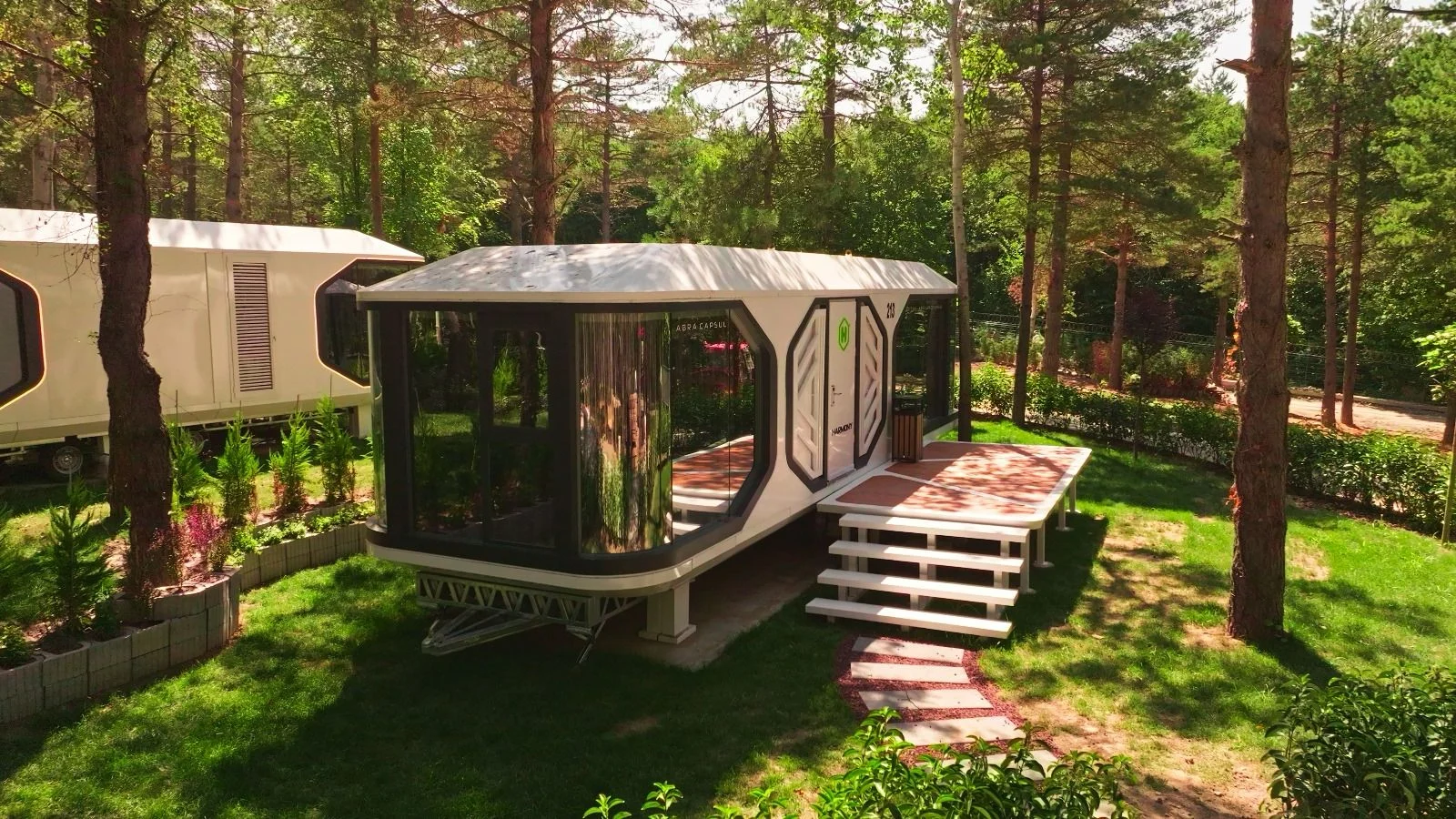 Capsule house among trees